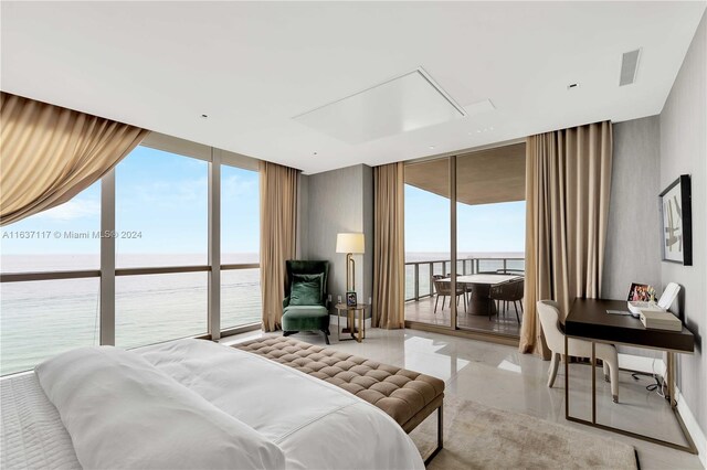 bedroom featuring access to exterior, a wall of windows, multiple windows, tile patterned flooring, and a water view