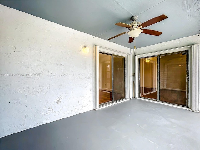 view of patio / terrace featuring ceiling fan