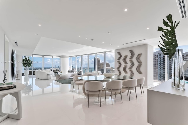 dining space with floor to ceiling windows