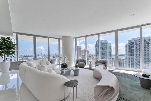 living room featuring a wall of windows