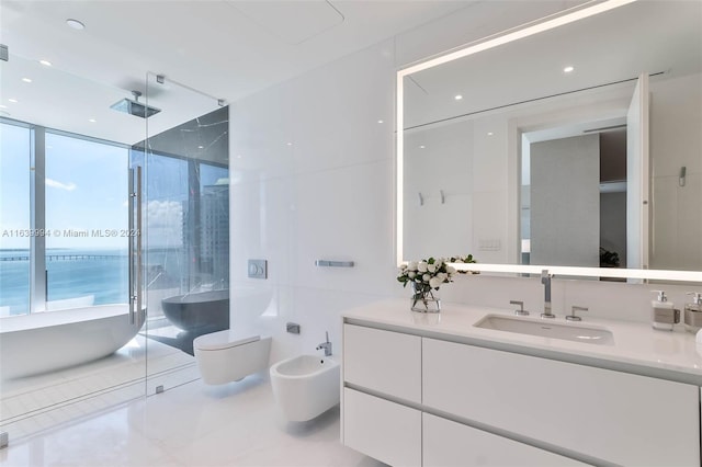 full bathroom with vanity, a bidet, a water view, toilet, and shower with separate bathtub