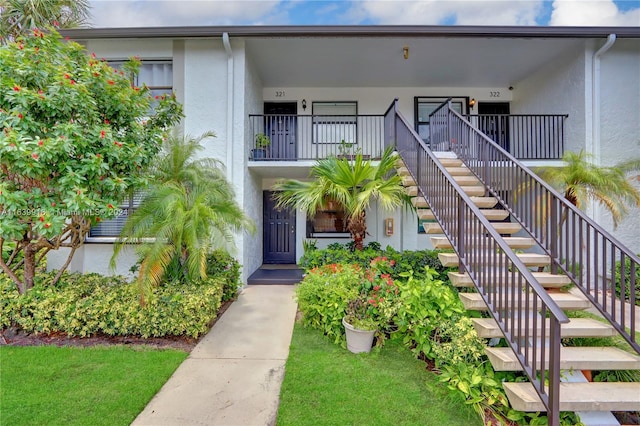 view of front of home with a balcony