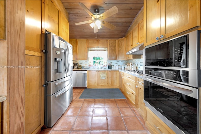 kitchen with backsplash, stainless steel appliances, sink, ceiling fan, and wood ceiling