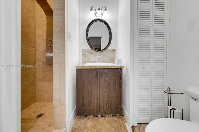 16255 SW 216th St, Miami, FL 33170 - bathroom featuring a closet, toilet, vanity, and a tile shower
