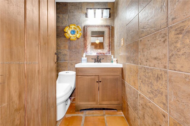 16255 SW 216th St, Miami, FL 33170 - bathroom with tile walls, vanity, and toilet