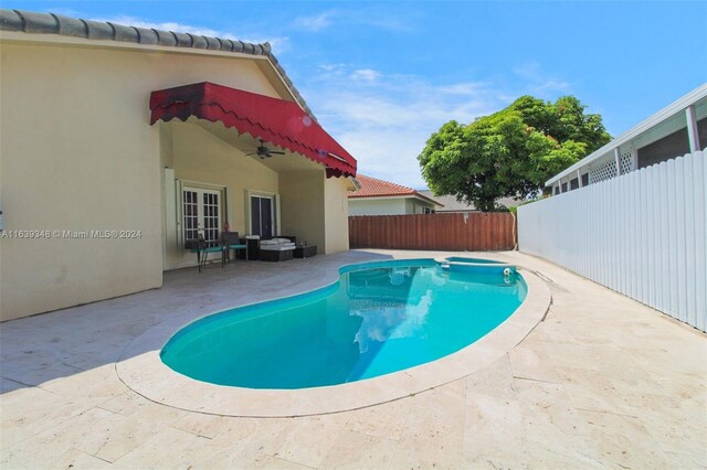 view of pool featuring a patio area