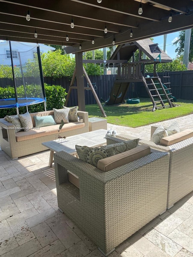 view of patio featuring a playground, a trampoline, and an outdoor living space