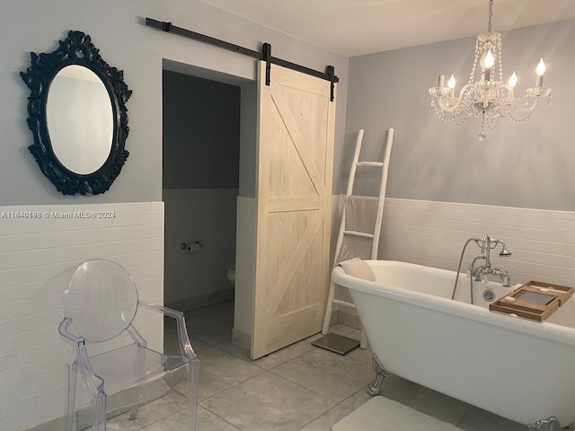 bathroom featuring tile walls, a notable chandelier, a tub to relax in, and tile patterned floors