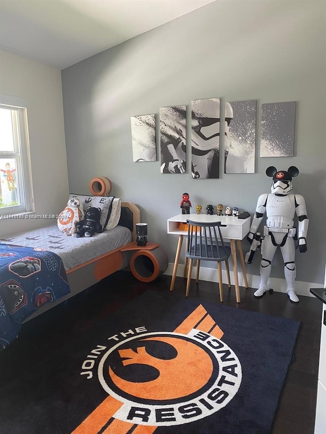 bedroom featuring wood-type flooring