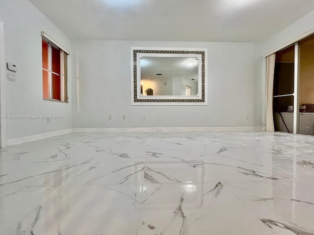 empty room featuring a textured ceiling