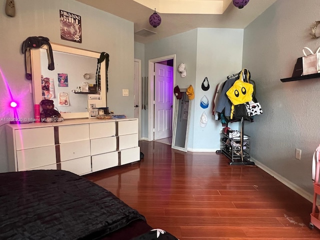 bedroom featuring dark hardwood / wood-style floors