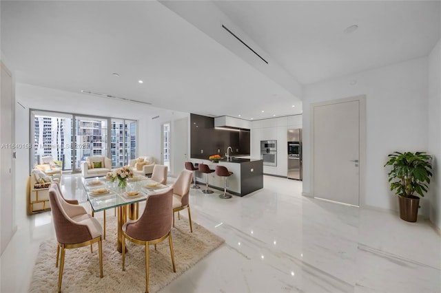 300 Biscayne Blvd Way Unit 2009, Miami, FL 33131 - dining room with recessed lighting and marble finish floor