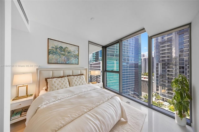 300 Biscayne Blvd Way Unit 2009, Miami, FL 33131 - bedroom featuring a view of city, multiple windows, and a wall of windows