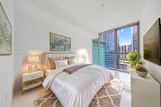 bedroom with floor to ceiling windows