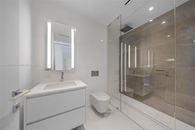 bathroom with tile patterned floors, walk in shower, vanity, and toilet