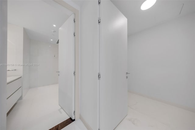 bathroom with vanity and tile patterned flooring