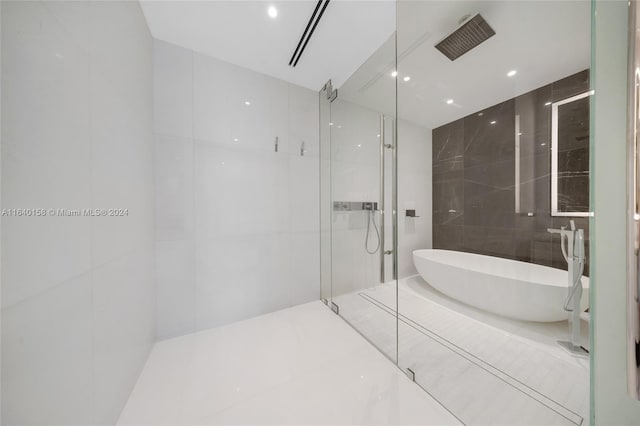 300 Biscayne Blvd Way Unit 2009, Miami, FL 33131 - full bath featuring a freestanding bath and a walk in shower