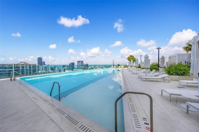 view of swimming pool with a patio area