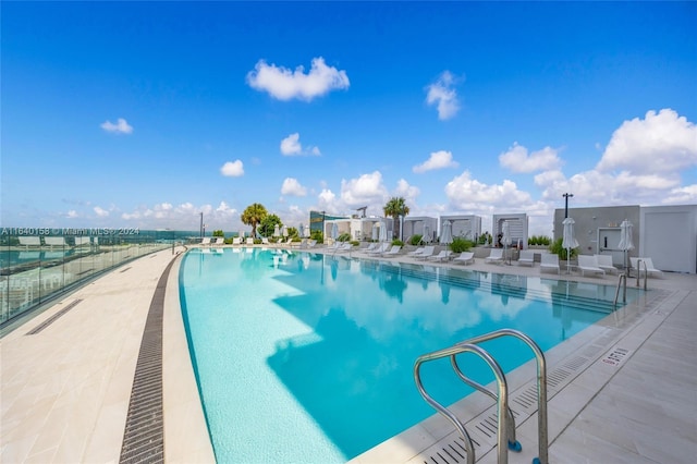 view of swimming pool featuring a patio