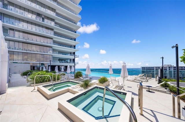 300 Biscayne Blvd Way Unit 2009, Miami, FL 33131 - view of pool featuring a hot tub and a water view