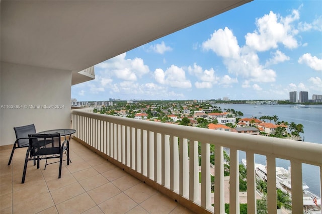 balcony featuring a water view