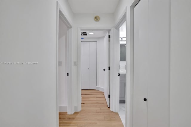 hall featuring light hardwood / wood-style floors