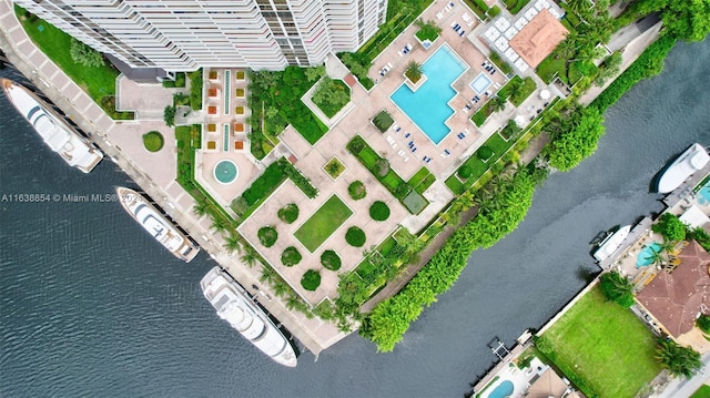 birds eye view of property featuring a water view