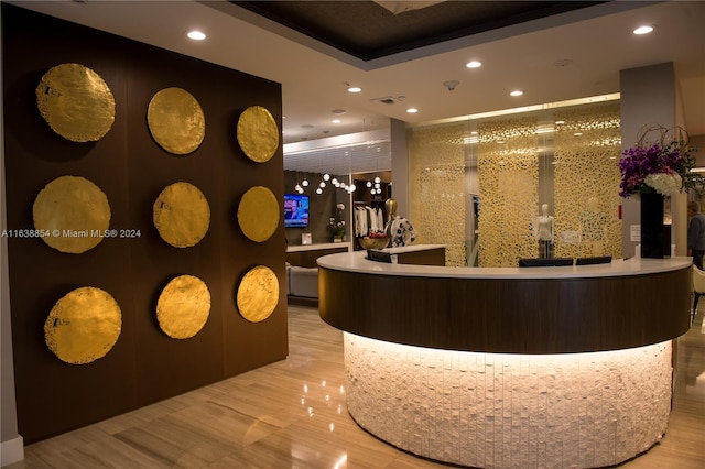 reception area featuring indoor bar