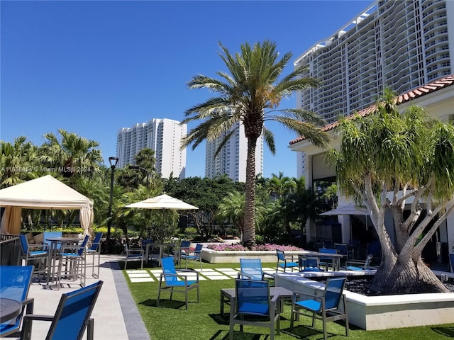 view of home's community with a patio