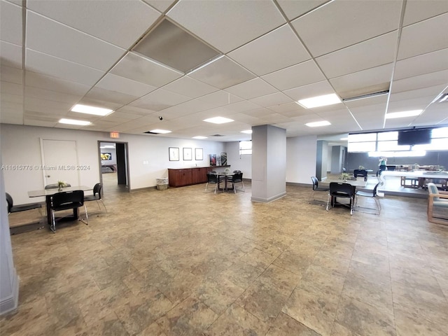 interior space featuring a paneled ceiling