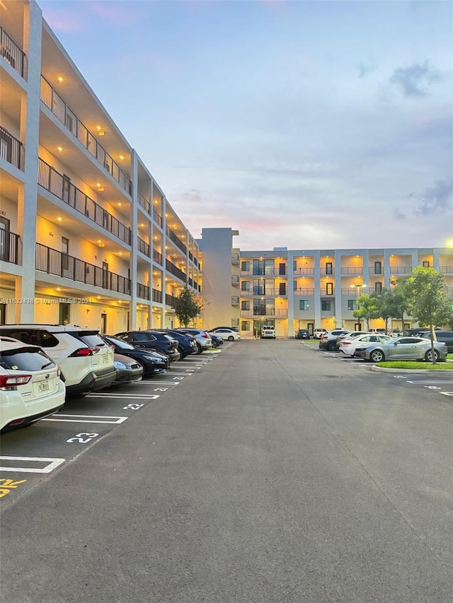 view of parking at dusk