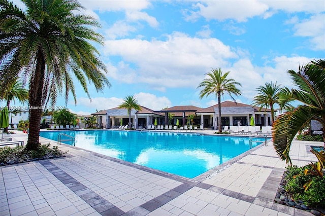 view of pool featuring a patio area