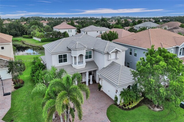 bird's eye view with a water view