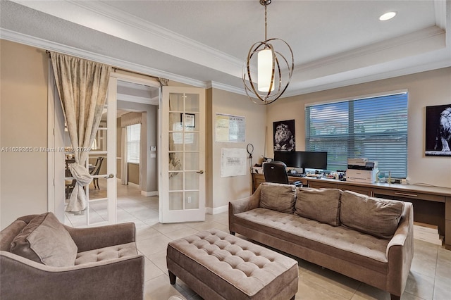 living room featuring a tray ceiling, light tile patterned floors, and crown molding