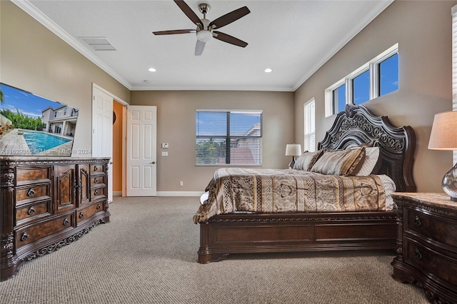 bedroom with carpet, crown molding, and ceiling fan