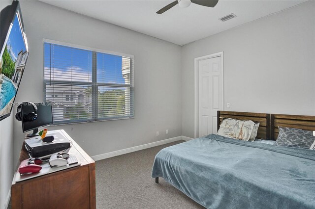 bedroom featuring carpet and ceiling fan