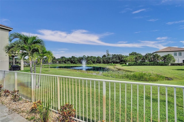 view of yard with a water view