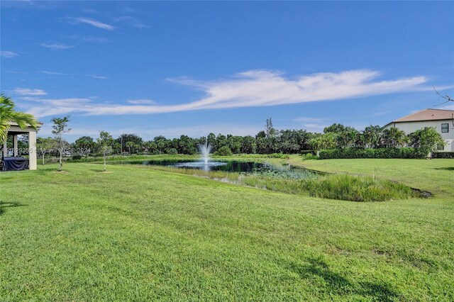 view of yard with a water view