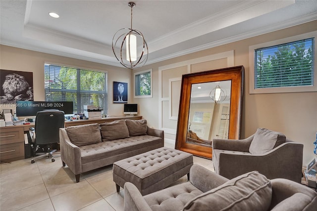 living room with a raised ceiling, a healthy amount of sunlight, and light tile patterned floors