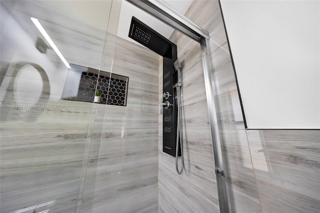 5740 NE 19th Ave, Fort Lauderdale, FL 33308 - bathroom featuring a shower stall