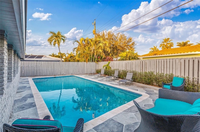 5740 NE 19th Ave, Fort Lauderdale, FL 33308 - view of pool with a fenced backyard, a patio, and a fenced in pool