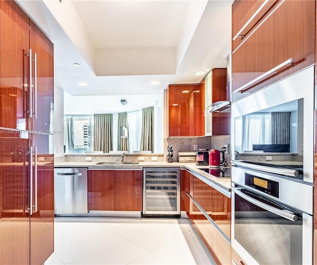 kitchen featuring wine cooler, tasteful backsplash, light tile patterned floors, black electric cooktop, and dishwasher