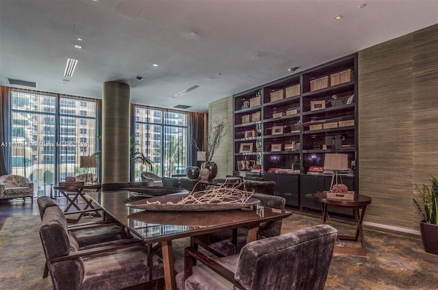 sitting room featuring expansive windows