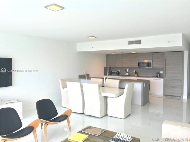 living room with light tile patterned floors