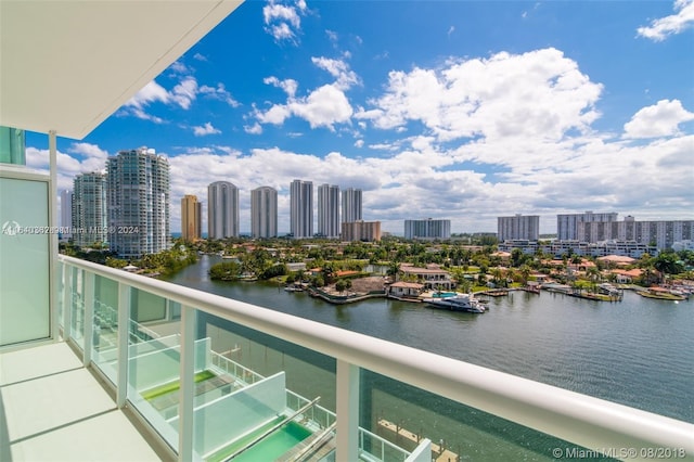 balcony featuring a water view