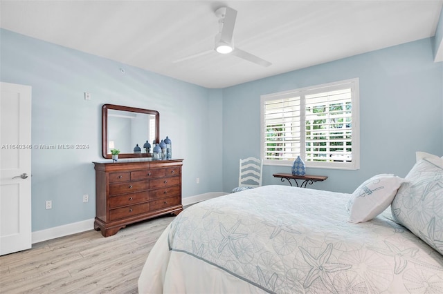 bedroom featuring ceiling fan and light wood-type flooring