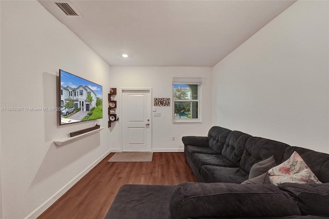 living room with dark wood-type flooring