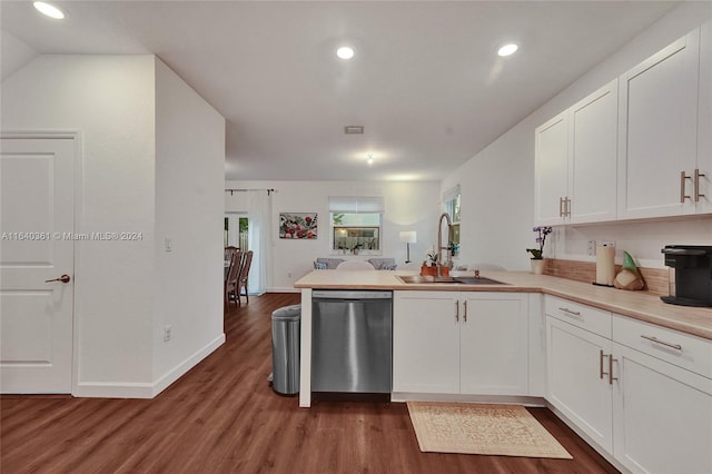 kitchen featuring dishwasher, white cabinetry, and a healthy amount of sunlight