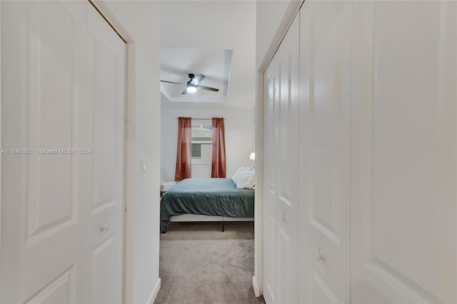 carpeted bedroom featuring ceiling fan