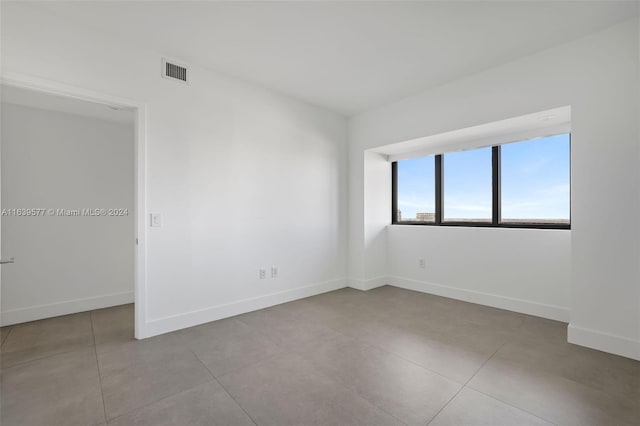 view of tiled empty room